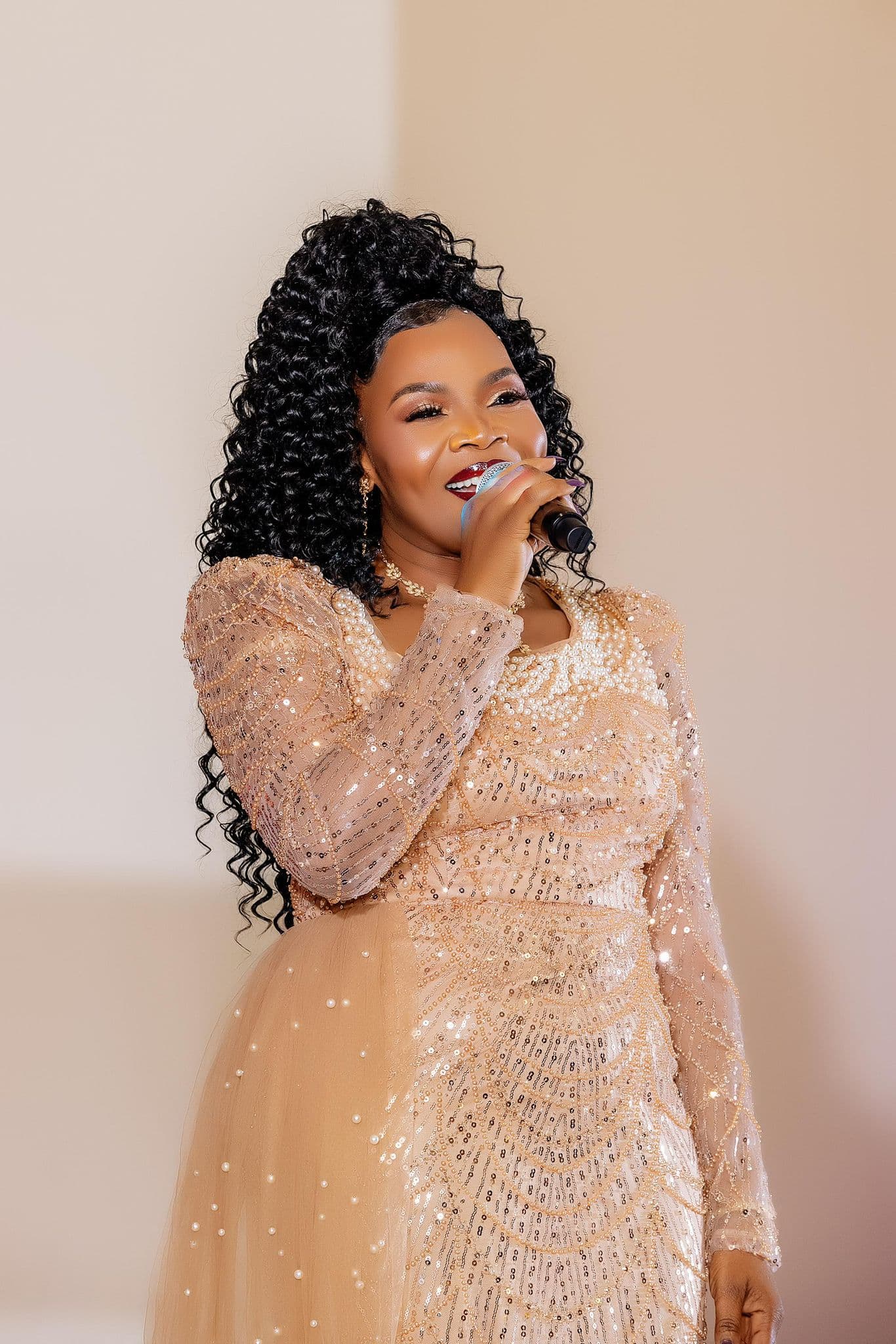 Pastor Rev Judith Babirye performing